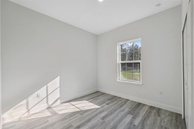 3159 SW 127th Lane Rd, Ocala, FL 34473 - unfurnished room with wood finished floors and a smoke detector