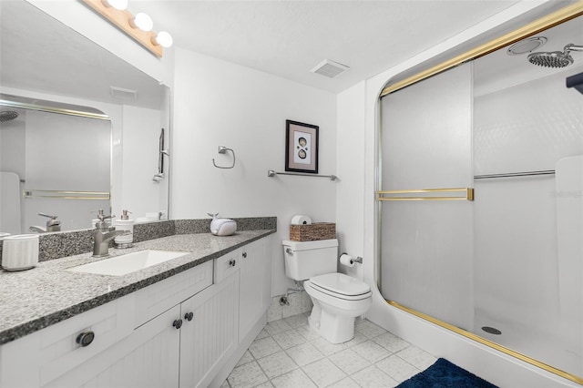 3023 S Atlantic Ave Unit 2050, Daytona Beach, FL 32118 - bathroom featuring vanity, a shower stall, and tile patterned flooring