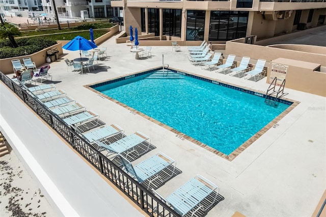 3023 S Atlantic Ave Unit 2050, Daytona Beach, FL 32118 - community pool featuring a patio