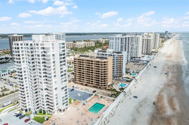 3023 S Atlantic Ave Unit 2050, Daytona Beach, FL 32118 - view of urban area with a pool area and waterfront with a beach