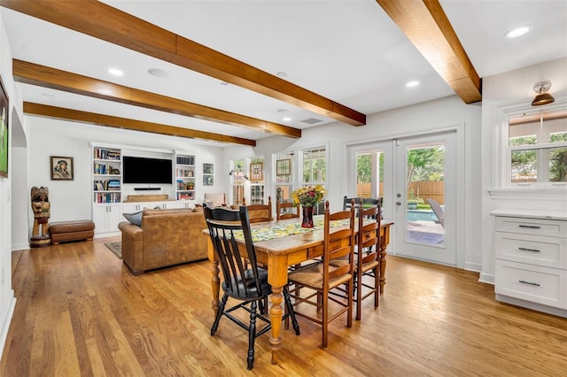 624 Richmond St, Orlando, FL 32806 - dining space with beamed ceiling, light wood finished floors, french doors, and recessed lighting