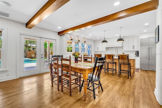 624 Richmond St, Orlando, FL 32806 - dining room with beam ceiling, light wood-style floors, healthy amount of natural light, french doors, and recessed lighting