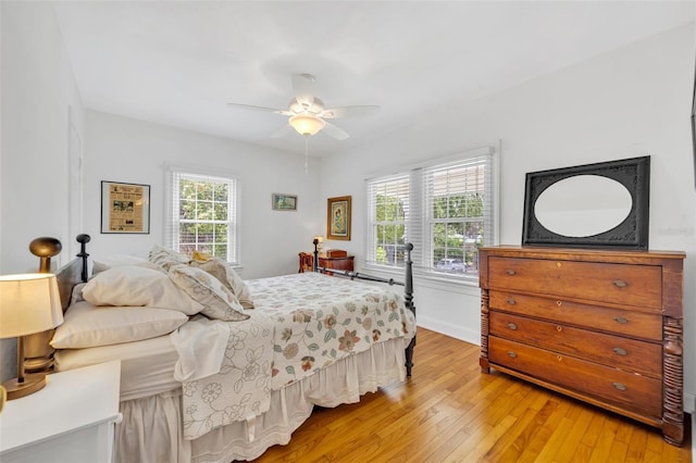624 Richmond St, Orlando, FL 32806 - bedroom with light wood-style floors and a ceiling fan