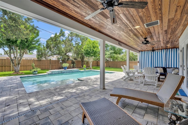 624 Richmond St, Orlando, FL 32806 - fenced backyard featuring a ceiling fan, a patio area, and outdoor dining space