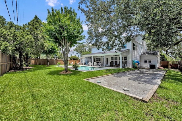 624 Richmond St, Orlando, FL 32806 - fenced backyard featuring a patio area