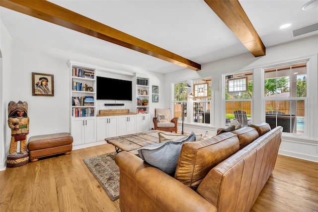 624 Richmond St, Orlando, FL 32806 - living room with beam ceiling, light wood finished floors, and recessed lighting