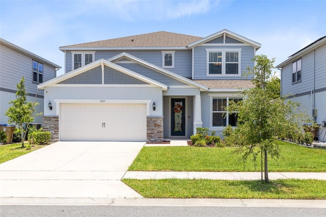 5677 Cedar Chase Dr, Saint Cloud, FL 34771 - craftsman-style home with a garage, a front lawn, driveway, stone siding, and roof with shingles
