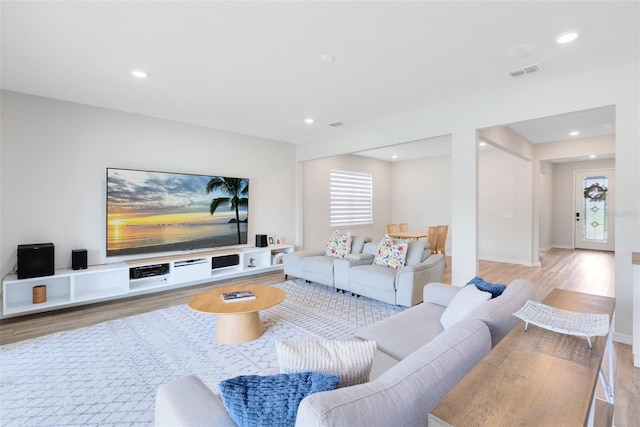 5677 Cedar Chase Dr, Saint Cloud, FL 34771 - living area featuring light wood finished floors and recessed lighting