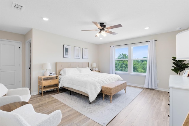 5677 Cedar Chase Dr, Saint Cloud, FL 34771 - bedroom featuring light wood-style flooring, a ceiling fan, and recessed lighting
