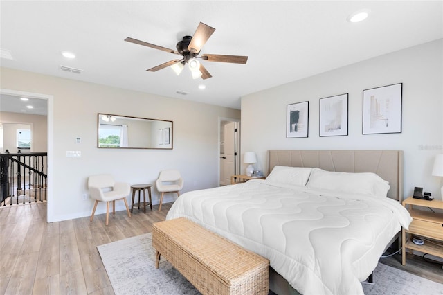 5677 Cedar Chase Dr, Saint Cloud, FL 34771 - bedroom featuring light wood-style flooring, recessed lighting, and a ceiling fan