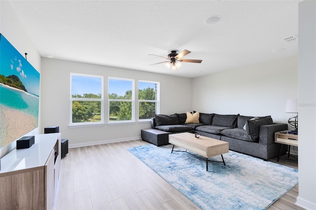 5677 Cedar Chase Dr, Saint Cloud, FL 34771 - living area with a ceiling fan and light wood-type flooring