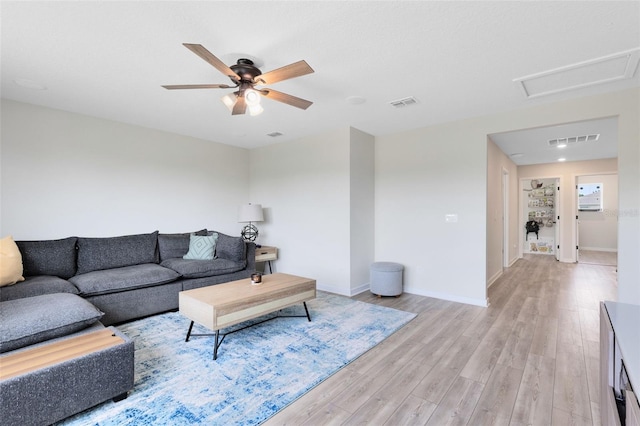 5677 Cedar Chase Dr, Saint Cloud, FL 34771 - living area with light wood-type flooring and ceiling fan