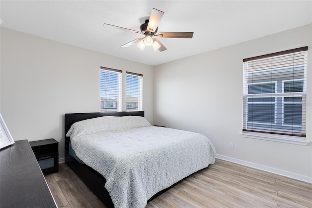 5677 Cedar Chase Dr, Saint Cloud, FL 34771 - bedroom featuring light wood-type flooring and ceiling fan