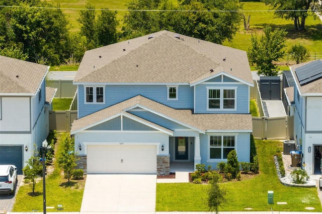 5677 Cedar Chase Dr, Saint Cloud, FL 34771 - view of front of property with a gate, roof with shingles, a garage, and driveway