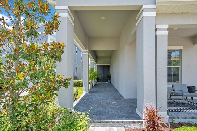 14189 Larkspur Lake Dr, Winter Garden, FL 34787 - entrance to property featuring stucco siding