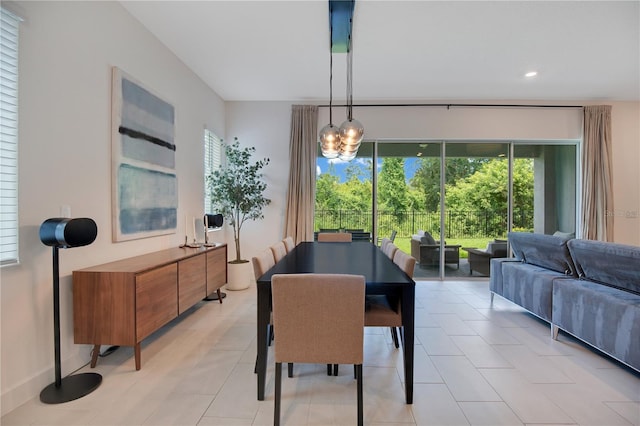 14189 Larkspur Lake Dr, Winter Garden, FL 34787 - dining room featuring a chandelier, recessed lighting, and light tile patterned flooring