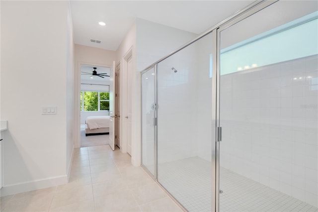14189 Larkspur Lake Dr, Winter Garden, FL 34787 - full bath with ensuite bath, a stall shower, tile patterned floors, ceiling fan, and vanity
