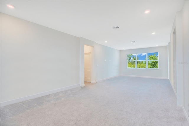 14189 Larkspur Lake Dr, Winter Garden, FL 34787 - empty room featuring light colored carpet and recessed lighting