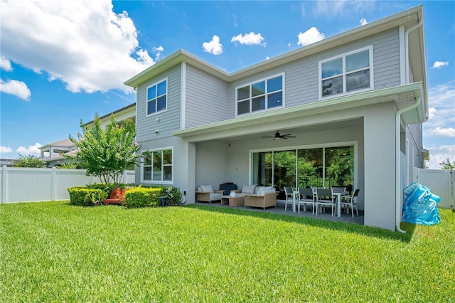 14189 Larkspur Lake Dr, Winter Garden, FL 34787 - rear view of house featuring an outdoor living space, a ceiling fan, stucco siding, and a patio