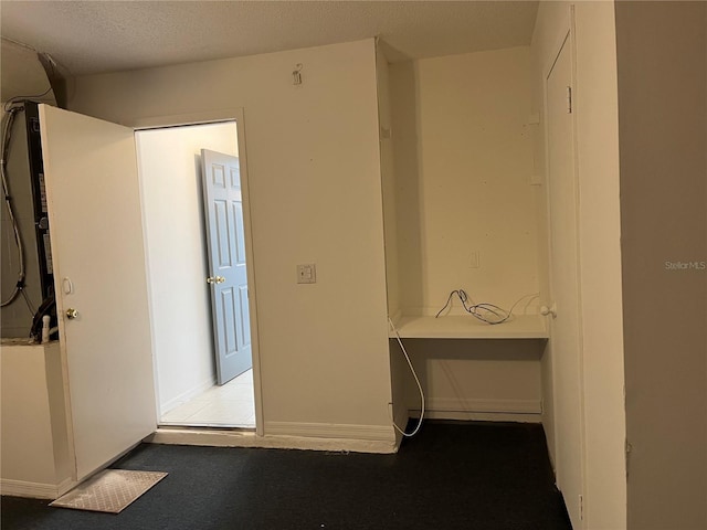 2421 Queenswood Cir, Kissimmee, FL 34743 - corridor with baseboards