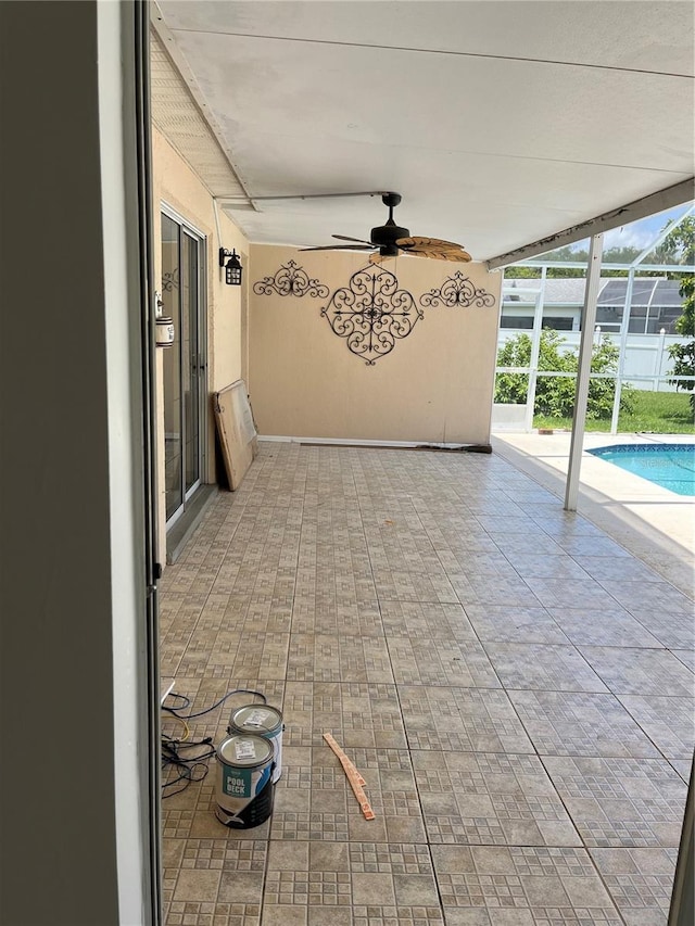 2421 Queenswood Cir, Kissimmee, FL 34743 - view of patio with ceiling fan, glass enclosure, and an outdoor pool