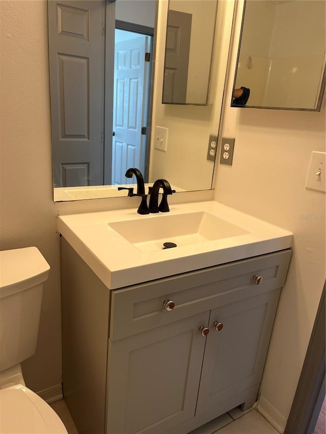 2421 Queenswood Cir, Kissimmee, FL 34743 - bathroom with vanity and toilet