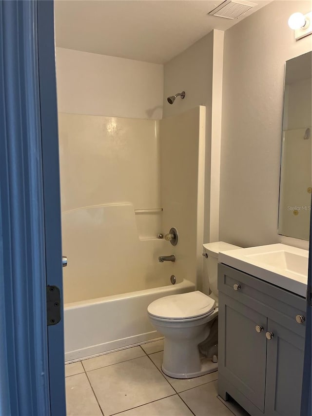 2421 Queenswood Cir, Kissimmee, FL 34743 - full bath with tile patterned flooring, shower / bath combination, and vanity