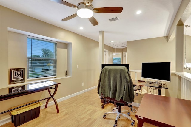 office area with wood finished floors, healthy amount of natural light, a ceiling fan, recessed lighting, and attic access