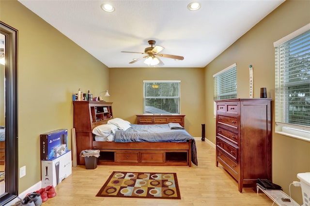bedroom featuring light wood-style floors, recessed lighting, and a ceiling fan