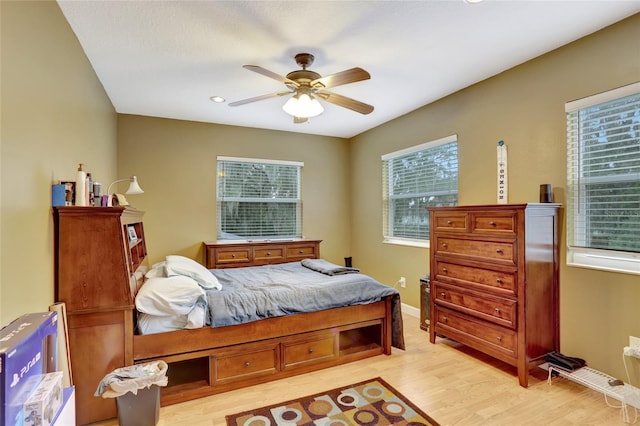 bedroom featuring light wood-style floors, ceiling fan, and recessed lighting