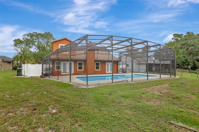 back of property featuring glass enclosure
