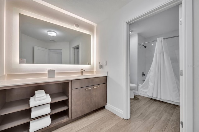 14501 Grove Resort Ave Unit 3239, Winter Garden, FL 34787 - bathroom with vanity, wood finished floors, and shower / bathtub combination with curtain
