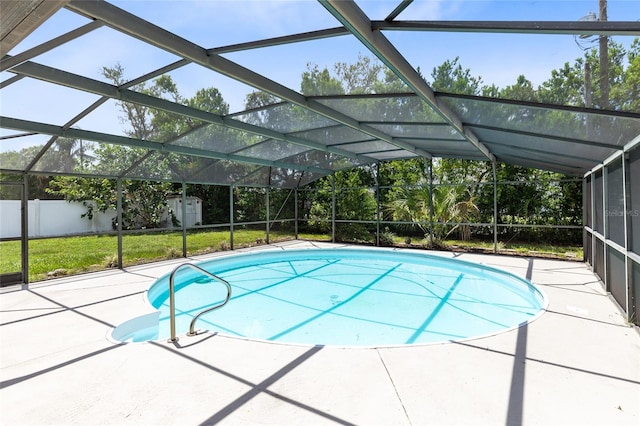 1736 Saxon Blvd, Deltona, FL 32725 - swimming pool featuring a patio, a fenced backyard, and glass enclosure