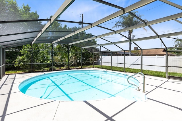 1736 Saxon Blvd, Deltona, FL 32725 - view of swimming pool with a patio and a lanai