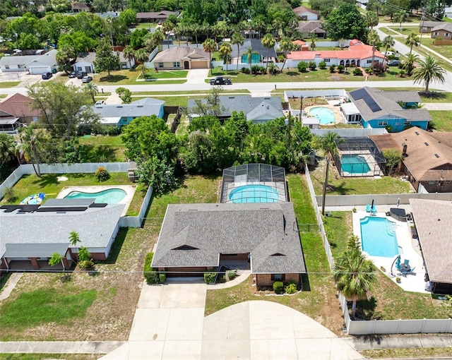 1736 Saxon Blvd, Deltona, FL 32725 - aerial perspective of suburban area featuring a pool area