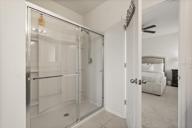 3537 Seneca Club Loop Unit B, Orlando, FL 32808 - bathroom with ensuite bathroom, a stall shower, ceiling fan, and tile patterned flooring