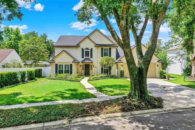 991 Hawthorne Cove Ct, Ocoee, FL 34761 - traditional-style house featuring stucco siding and concrete driveway