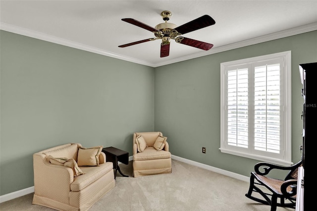 991 Hawthorne Cove Ct, Ocoee, FL 34761 - living area featuring carpet floors, ceiling fan, and crown molding