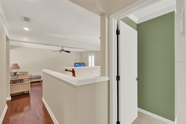 991 Hawthorne Cove Ct, Ocoee, FL 34761 - hallway featuring crown molding, wood finished floors, an upstairs landing, and recessed lighting