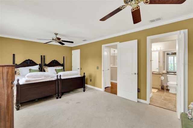 991 Hawthorne Cove Ct, Ocoee, FL 34761 - bedroom with light colored carpet, ornamental molding, connected bathroom, and ceiling fan