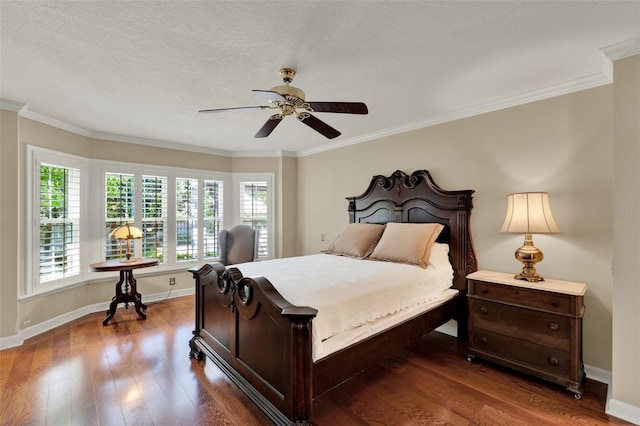991 Hawthorne Cove Ct, Ocoee, FL 34761 - bedroom with dark wood-style floors, crown molding, and ceiling fan