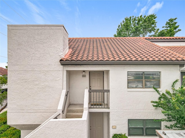 260 Killarney Bay Ct Unit 6-6, Winter Park, FL 32789 - view of front of house featuring stucco siding