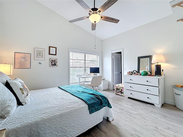 260 Killarney Bay Ct Unit 6-6, Winter Park, FL 32789 - bedroom featuring light wood-style flooring, high vaulted ceiling, an office area, and a ceiling fan