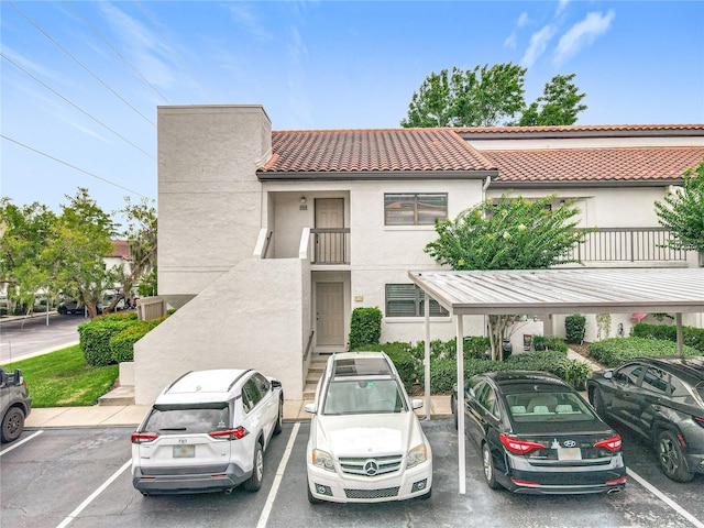 260 Killarney Bay Ct Unit 6-6, Winter Park, FL 32789 - view of property featuring uncovered parking