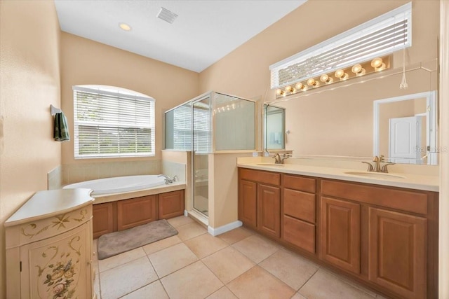 3954 Old Dunn Rd, Apopka, FL 32712 - bathroom featuring a shower stall, a bath, double vanity, and tile patterned floors
