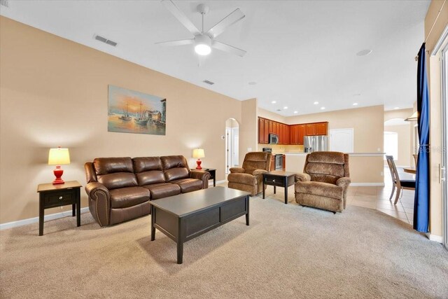 3954 Old Dunn Rd, Apopka, FL 32712 - living room with light carpet, ceiling fan, baseboards, arched walkways, and recessed lighting