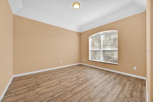 3954 Old Dunn Rd, Apopka, FL 32712 - empty room featuring wood finished floors and baseboards