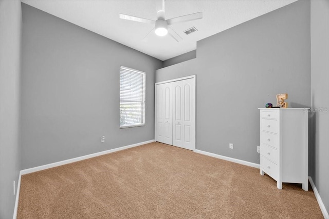 3954 Old Dunn Rd, Apopka, FL 32712 - unfurnished bedroom featuring carpet flooring, baseboards, a closet, and a ceiling fan