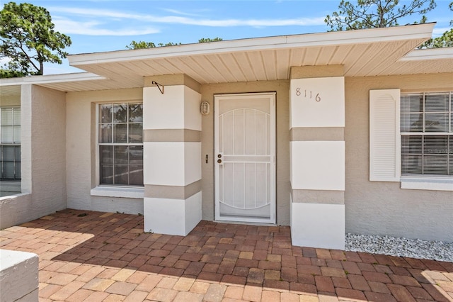 8116 Parrot Dr, Orlando, FL 32825 - entrance to property featuring stucco siding