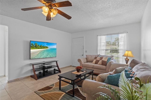 8116 Parrot Dr, Orlando, FL 32825 - living room with a textured ceiling, light tile patterned floors, and ceiling fan